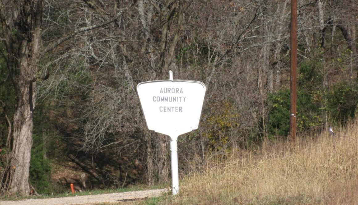 Aurora-Community-Center-sign-Madison-Co-Arkansas-2011-Nov-scaled