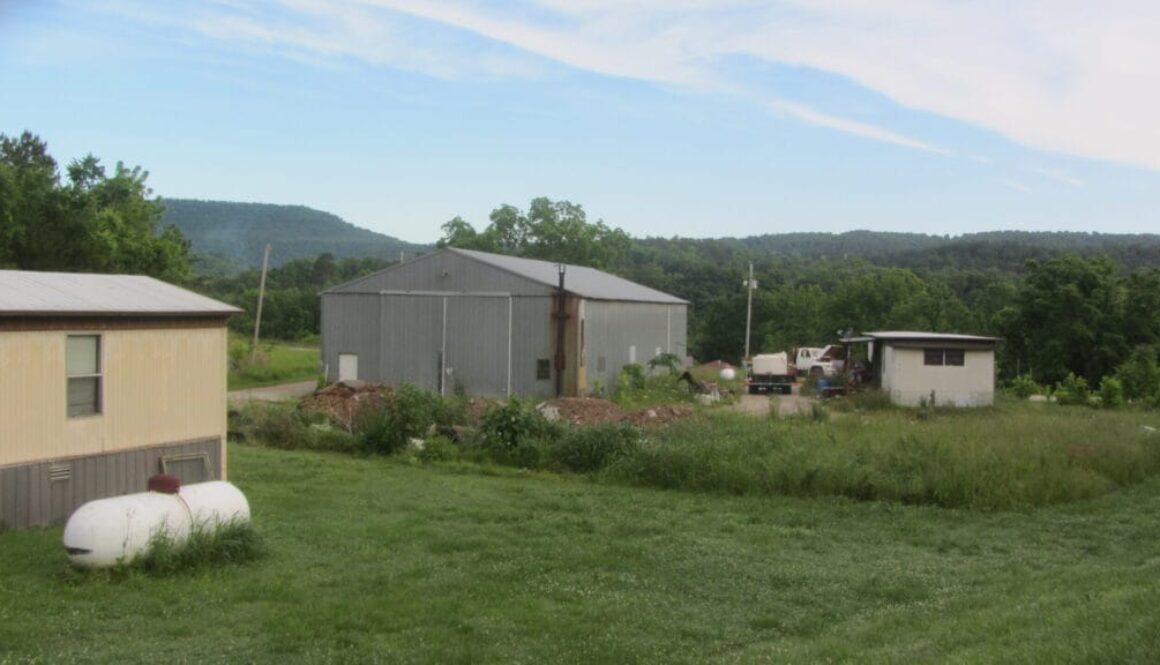 junky-trailers-above-road-Newton-County-AR-IMG_7921-scaled
