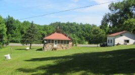 Stone-cabin-Arkansas-House-from-back-2015ish-1-scaled