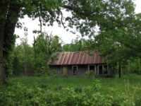 Cave-Mountain-House-Falling-down-May-9-2010-scaled